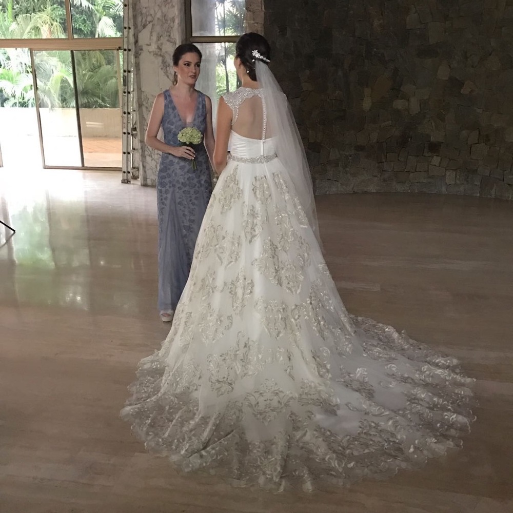 Special + unique Cristiano Lucci wedding dress.